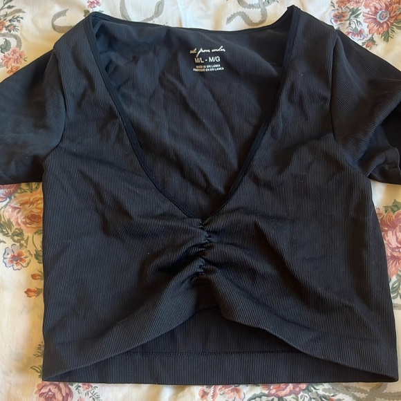 Urban Outfitters Tops - Out from under go for gold black crop top! M/L